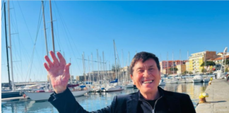 Testo e significato canzone Apri tutte le porte di Gianni Morandi